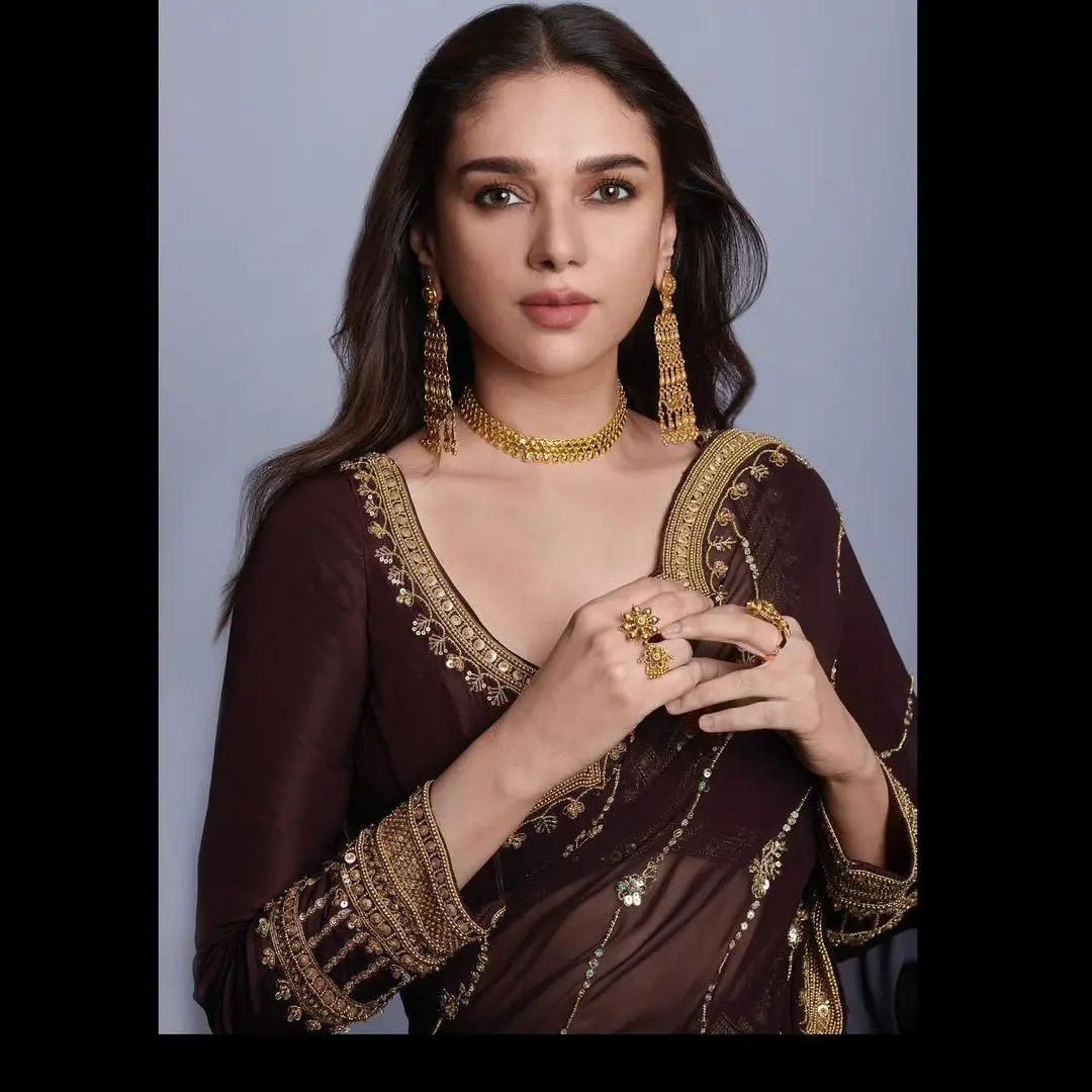 Bollywood Actress Aditi Rao Hydari In Maroon Lehenga Choli